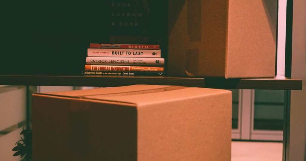 Declutter your garage by placing items in boxes ready for the thrift shop.