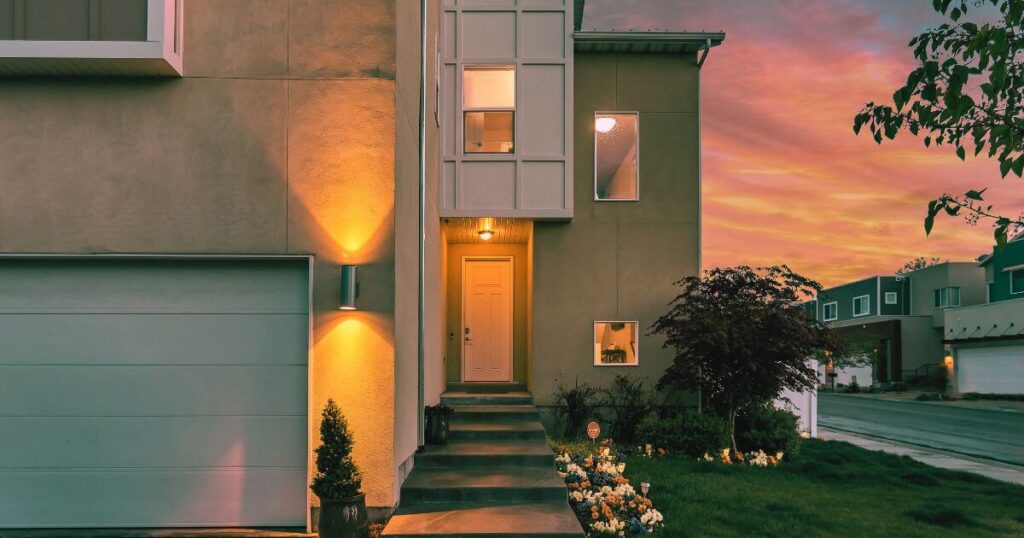 Home with a garage that looks well-maintained and neat.