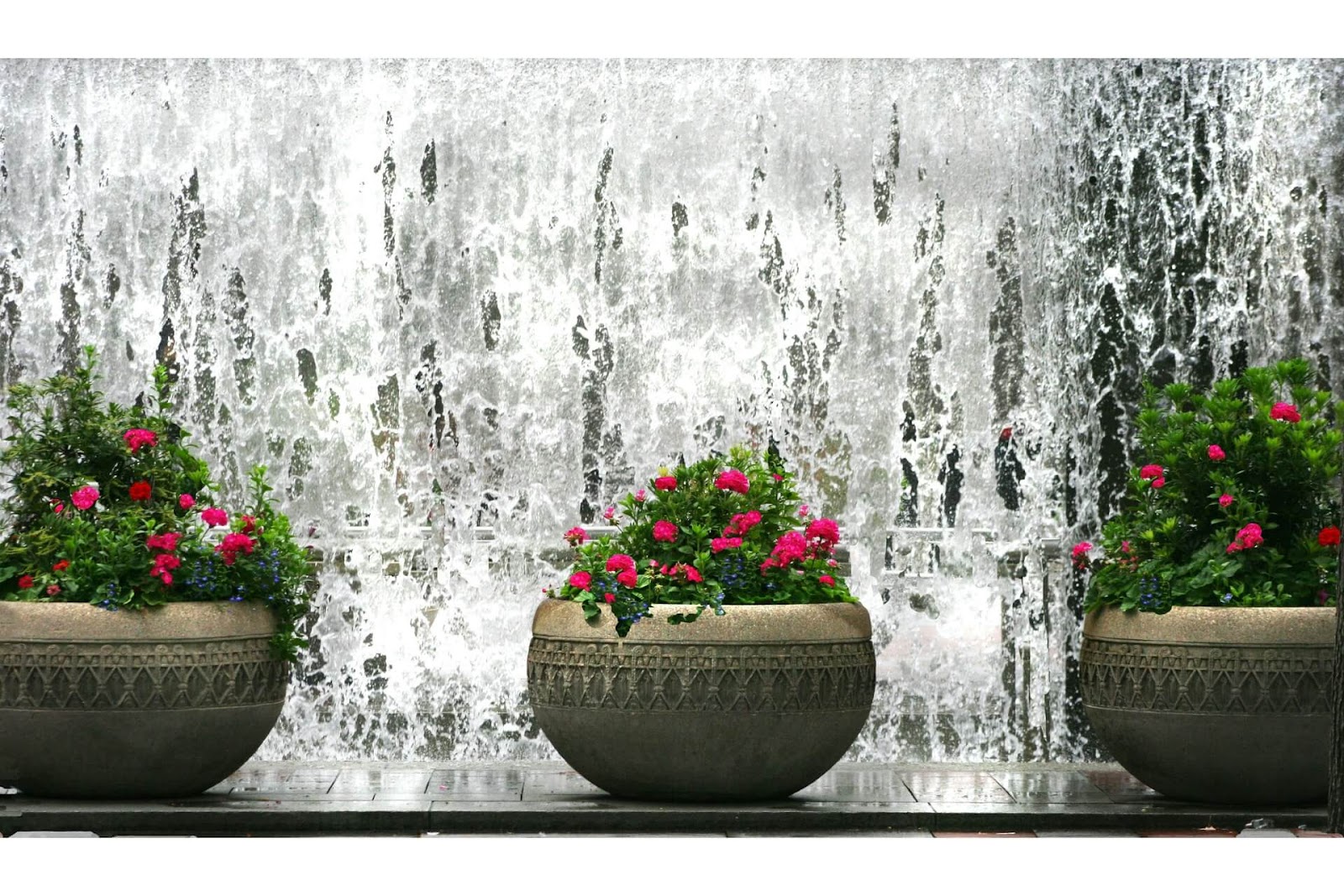 Add a dynamic office surface with a curtain of water that drowns out other noises.