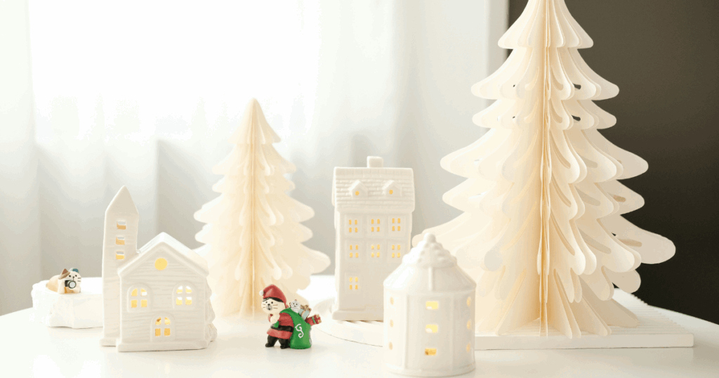 A white Christmas display on a table.