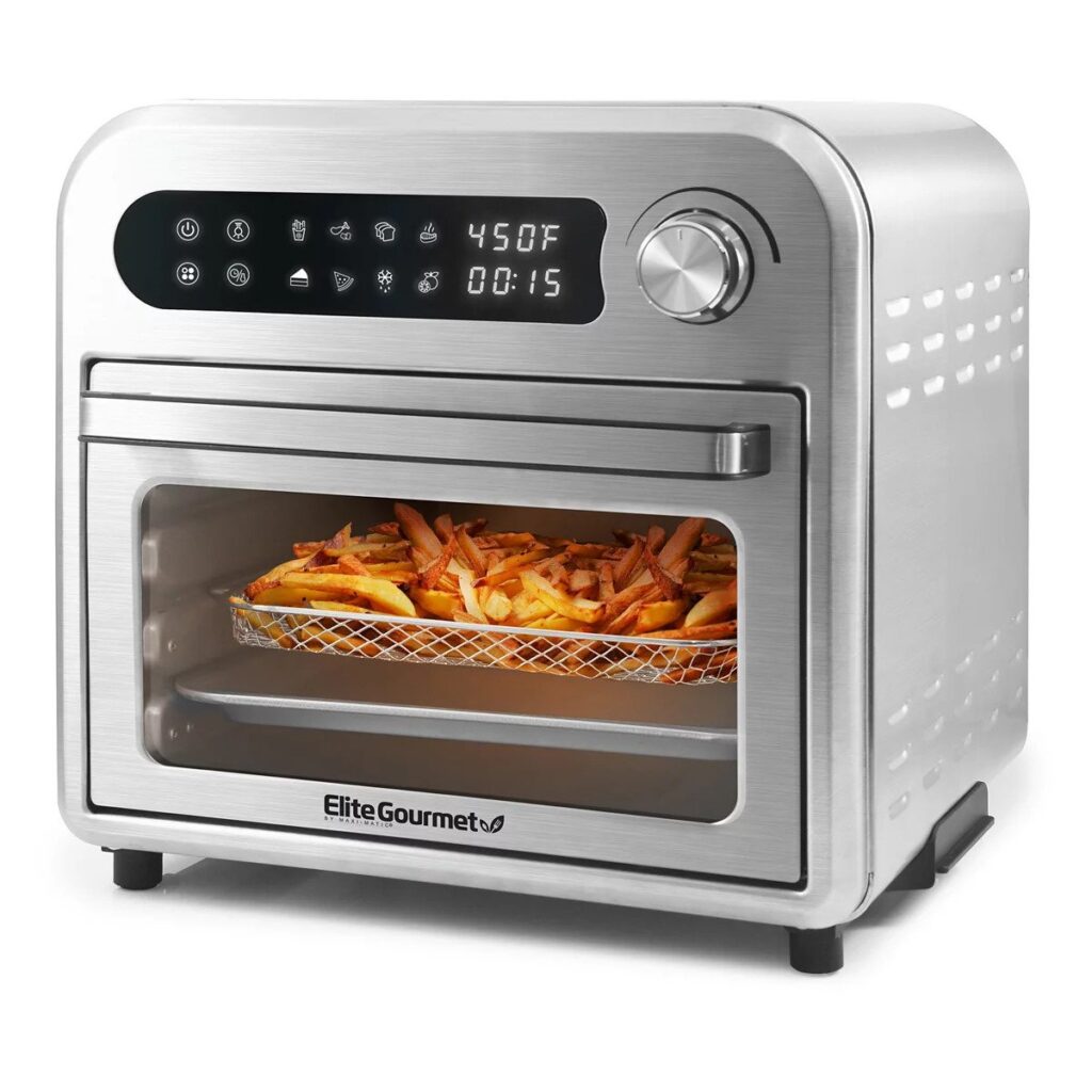 a silver air fryer with fried inside