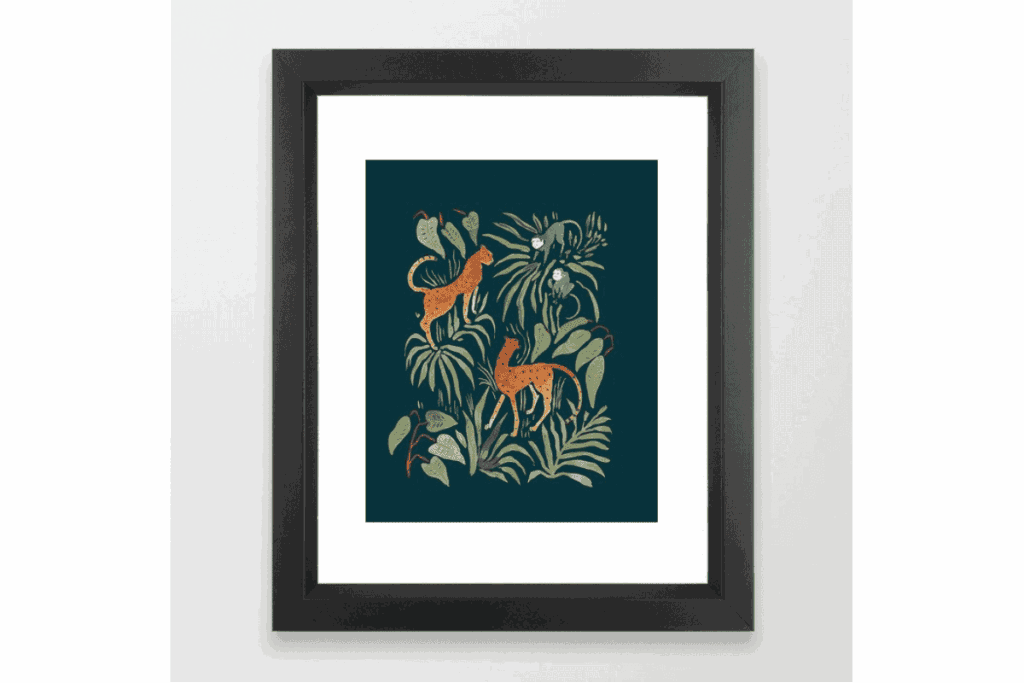 a black framed photo of quirky tiger in grass