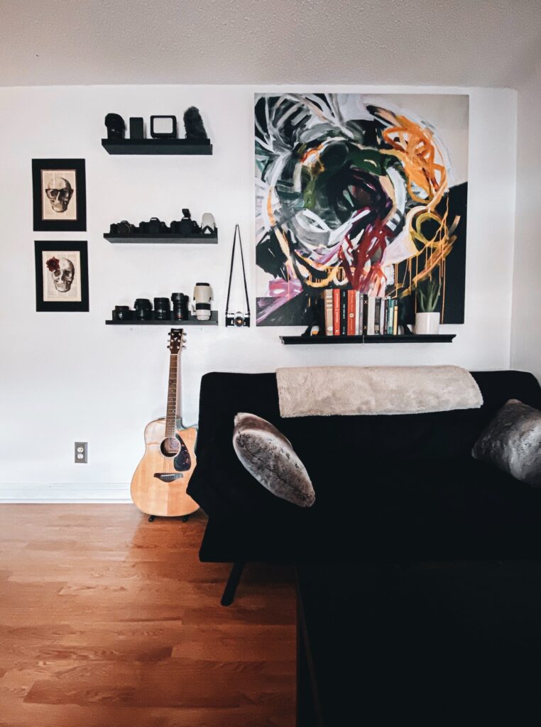 a large painting hung on a gallery wall