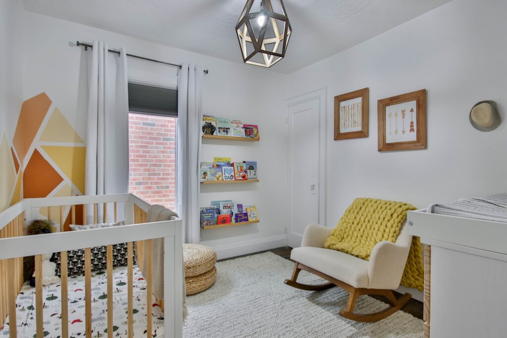 a calm nursery with a rocking chair