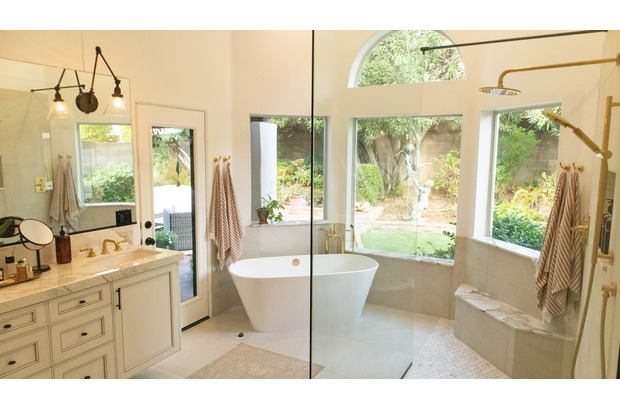 Renovate and add a bay window to increase your bathroom size and turn it into a wet room.