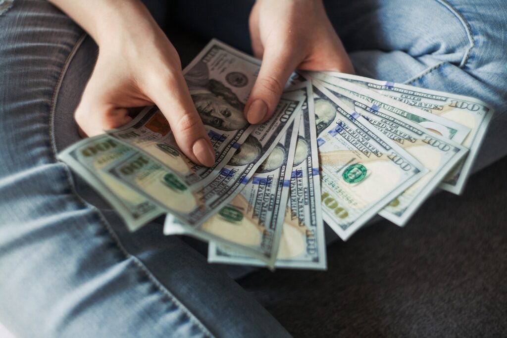 Someone holding money