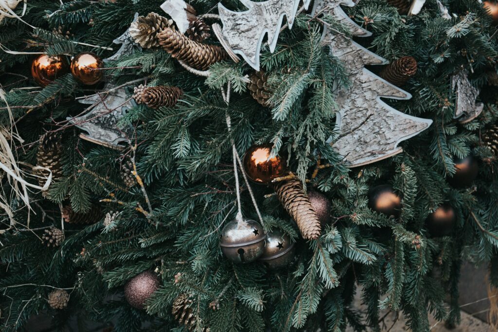 Christmas Tree with pinecones, bells and wood ornaments