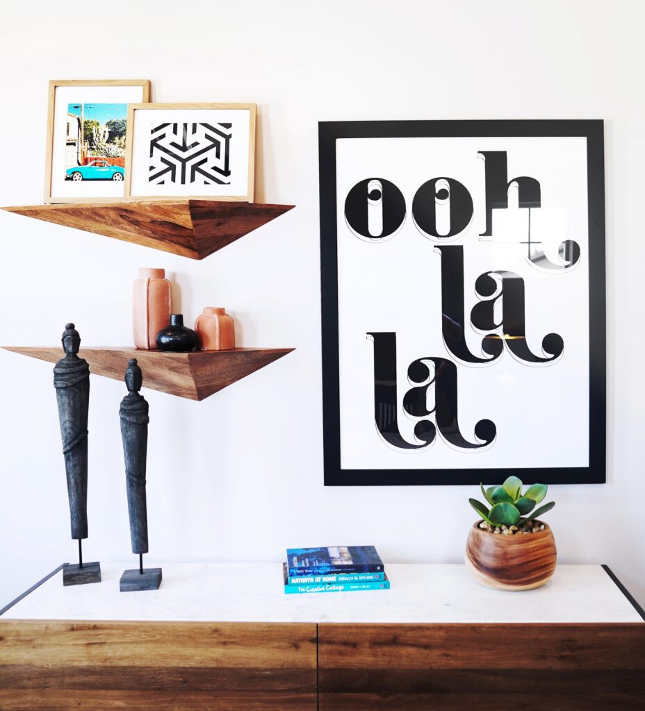 retro art on shelves and hanging on the wall