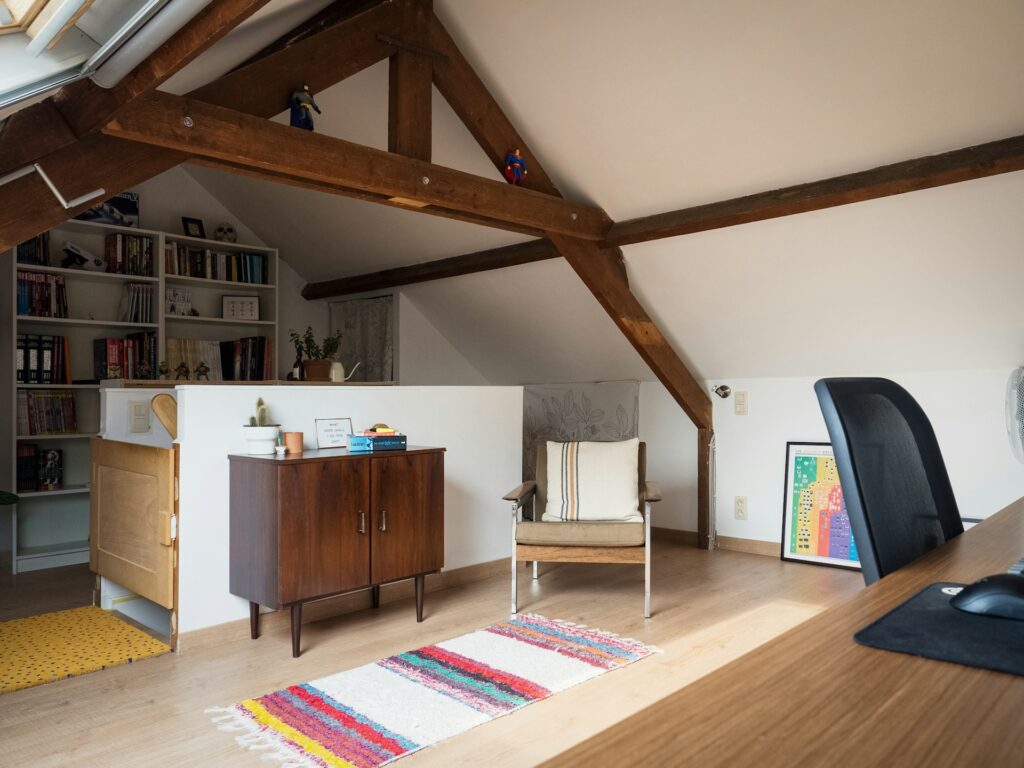 renovated home office setup in an attic