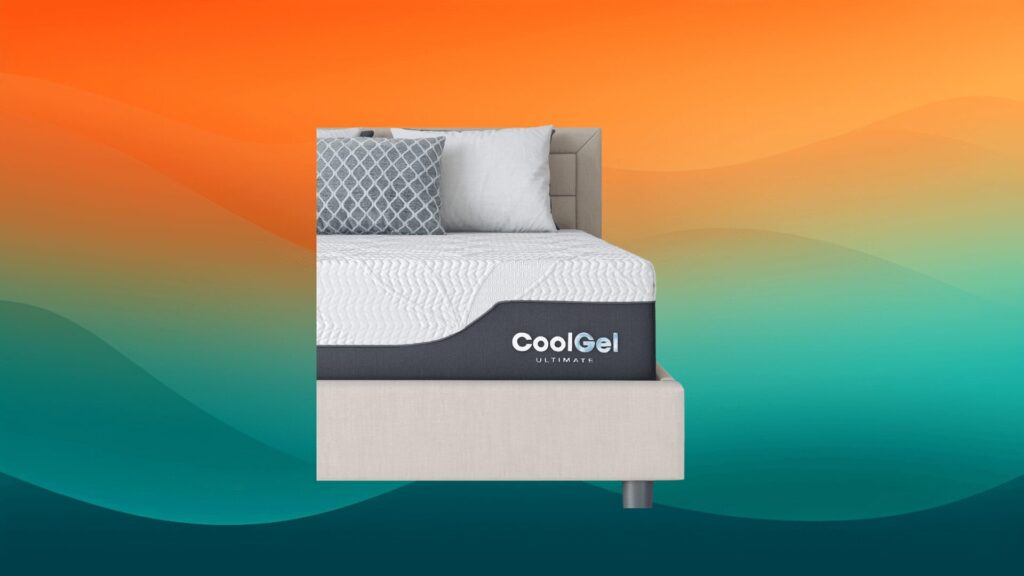 white and gray mattress on a tan bed frame in front of an orange and teal background