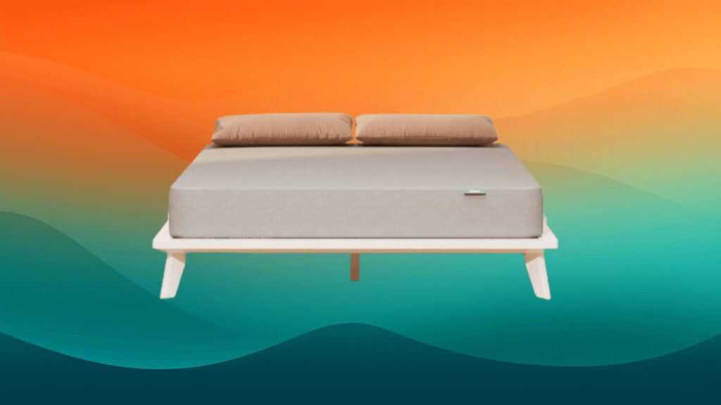 gray best affordable mattress on a wooden bed frame in front of an orange and teal background