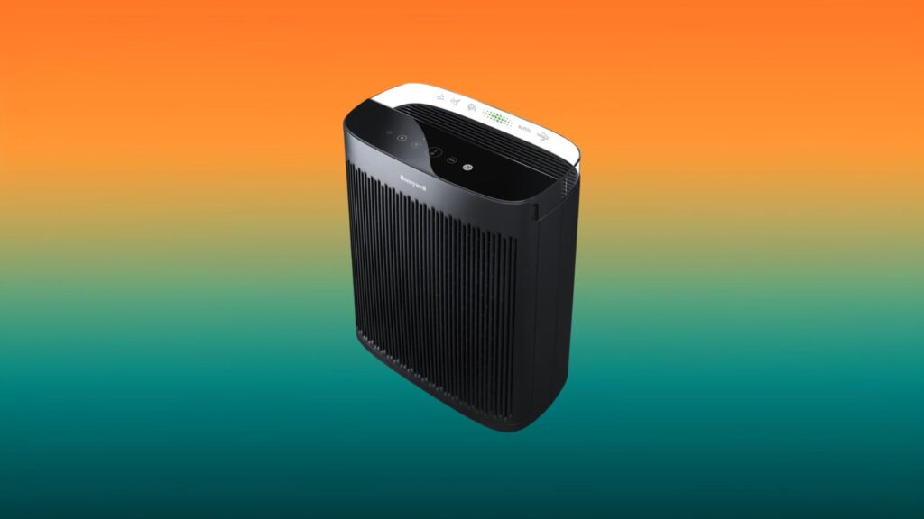 black Honeywell air purifier with an orange and teal gradient background