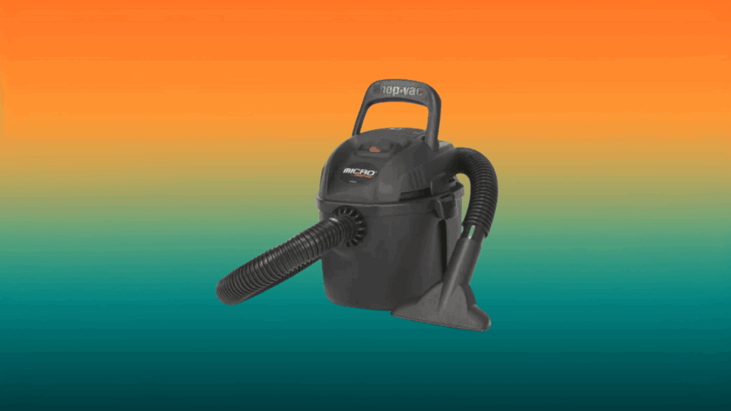 black Shop-Vac vacuum in front of an orange and teal gradient background