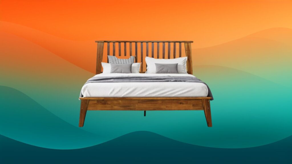 light wooden stained bed frame in front of an orange and teal background