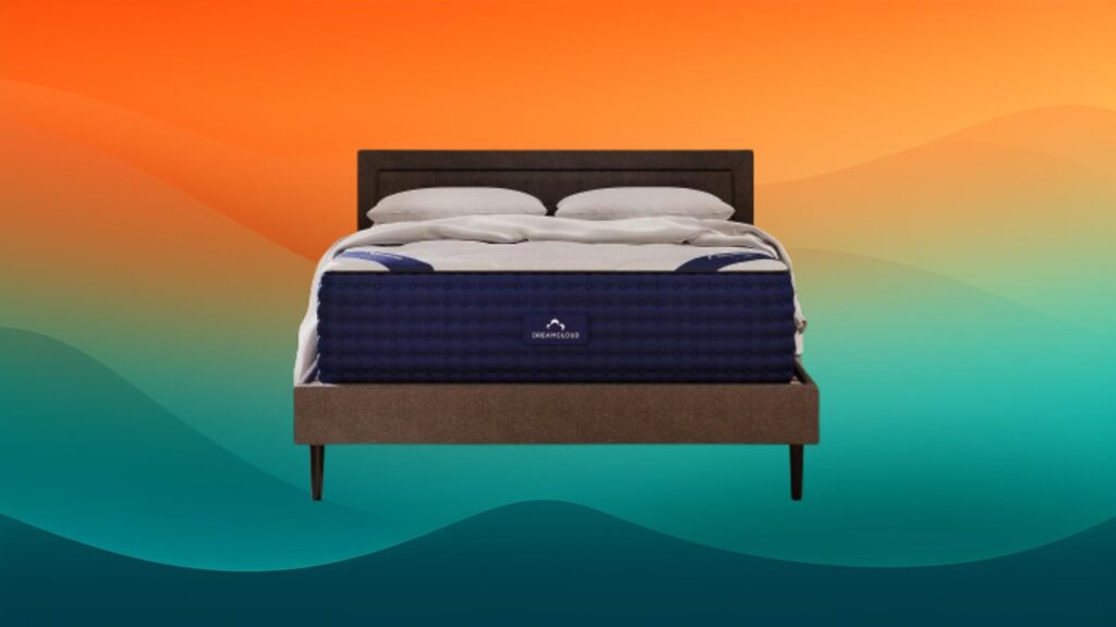 blue and white mattress on top of a dark gray bed frame with an orange and teal gradient background