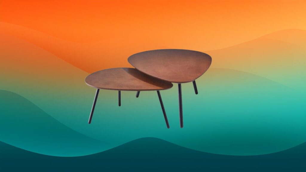 two wooden oval nested coffee tables in front of an orange and teal gradient background