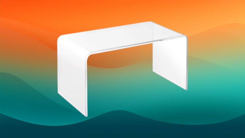 clear acrylic coffee table in front of an orange and teal gradient background
