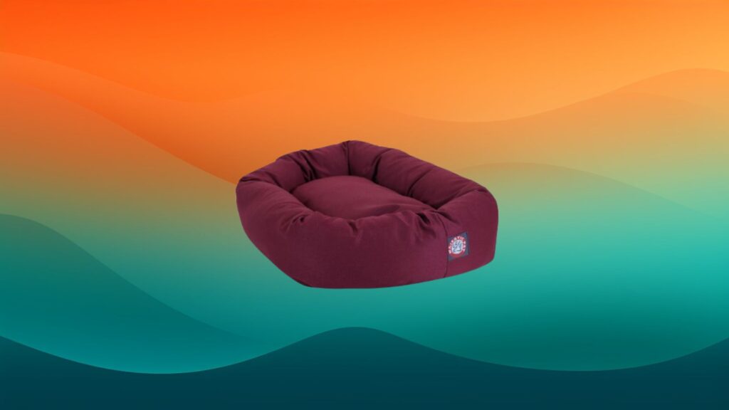 rectangular maroon red best dog bed in front of an orange and teal background