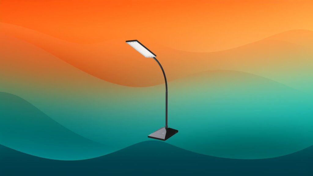 thin rectangular black reading light in front of an orange and teal background