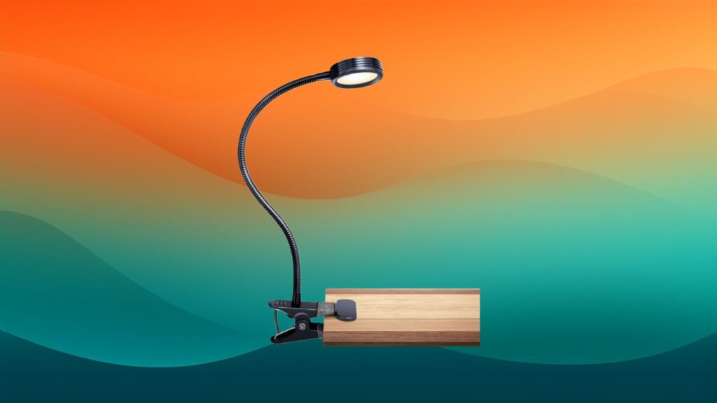 circular black clip on best reading lamp in front of an orange and teal background