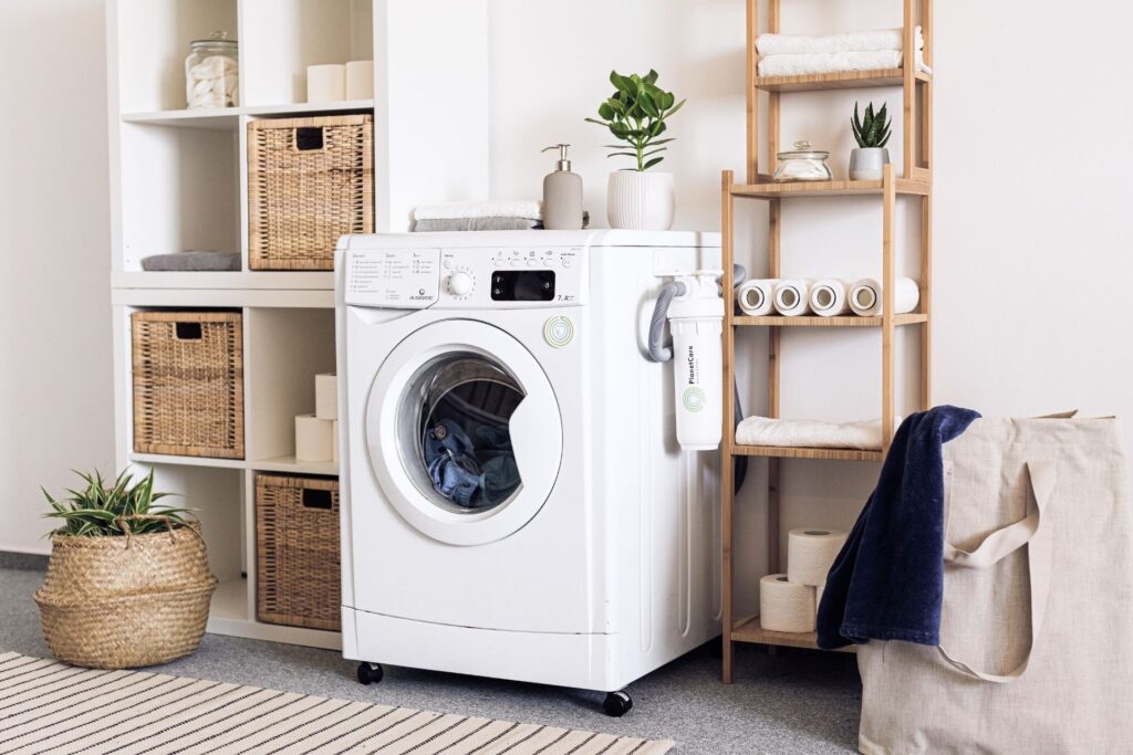 washing machine with storage shelves on either side