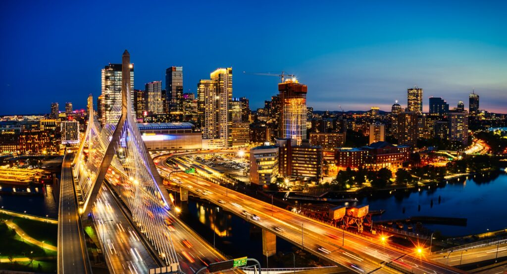 a bustling boston skyline at night