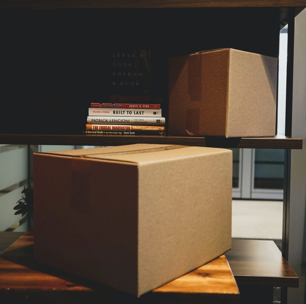 two cardboard boxes for donation to declutter