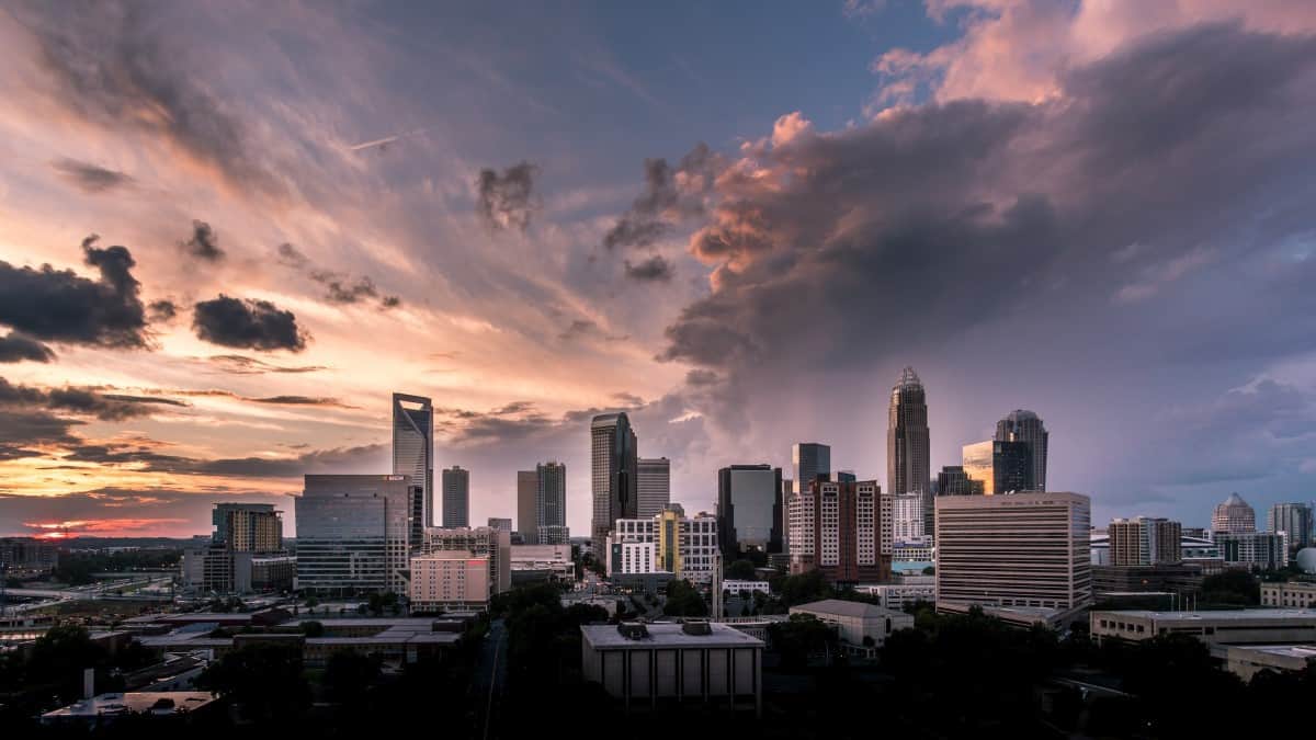 charlotte sunrise over a city