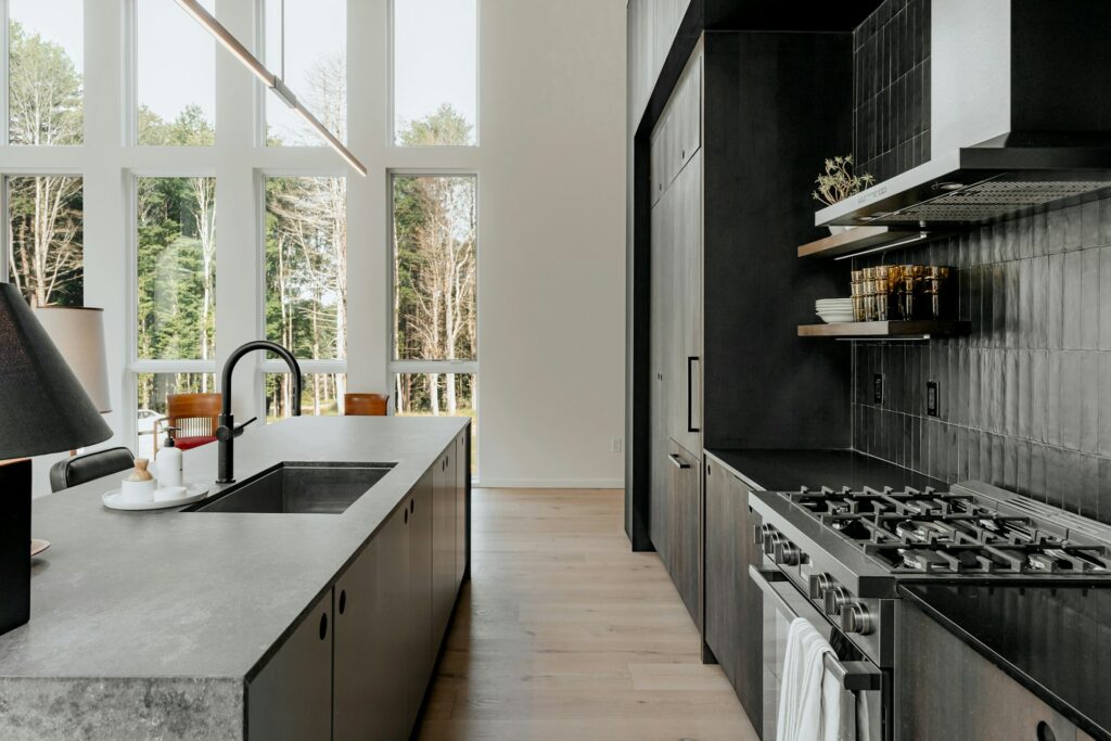 Luxury Black Kitchen With Stone Countertops