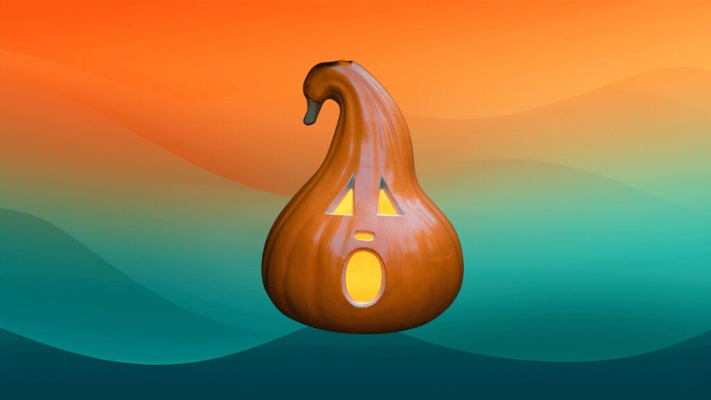outdoor faux jack-o-lantern in front of an orange and teal background