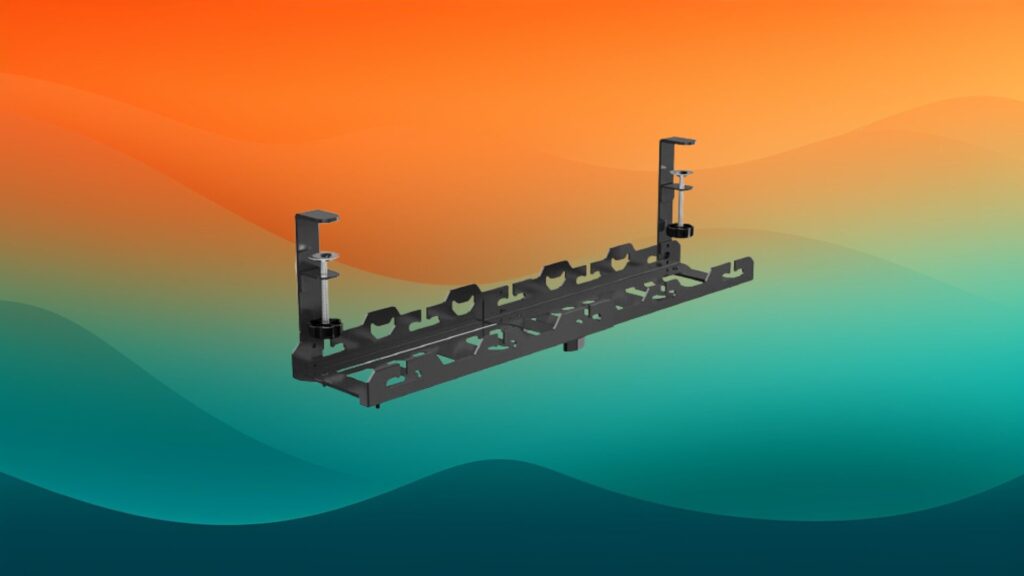 black cable management tray for home office organization in front of an orange and teal gradient background