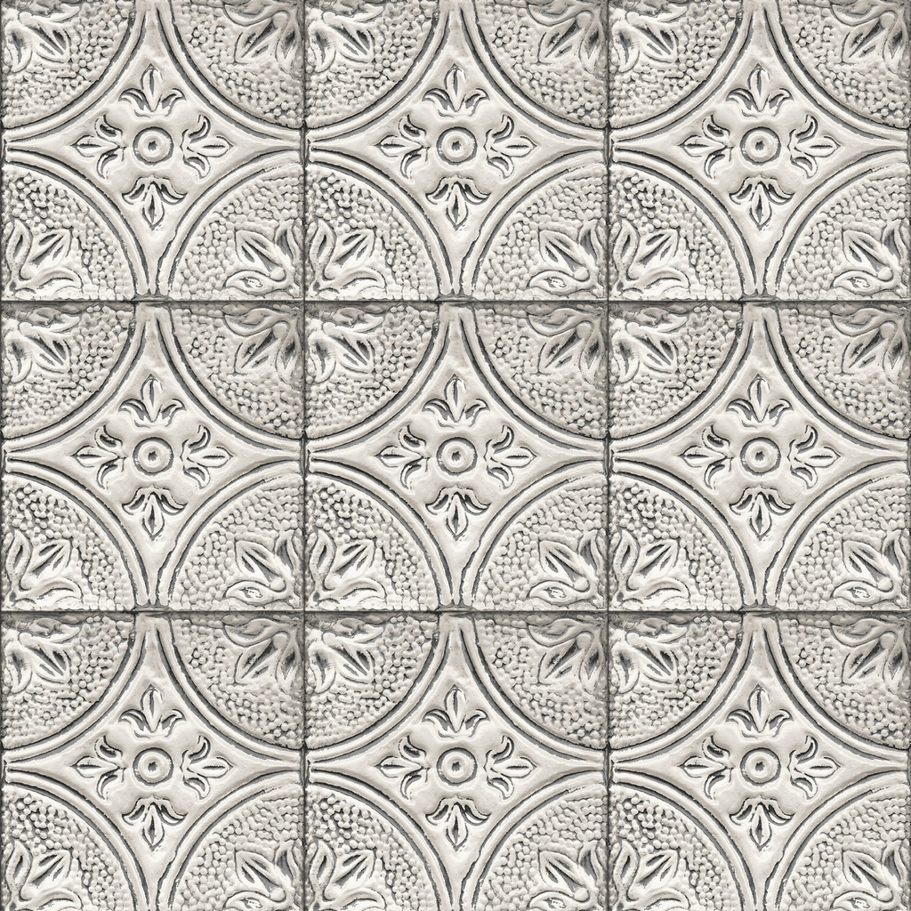 Nine silver tin backsplash tiles with a flower pattern