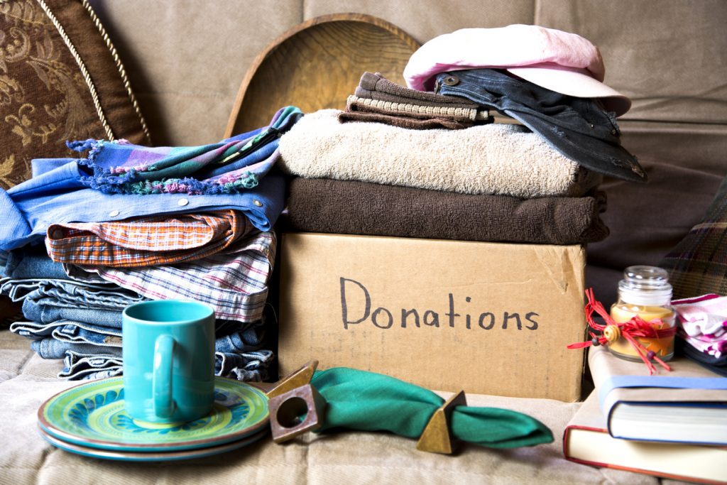 Items gathered to be donated to incorporate modern decor style in your home on a budget