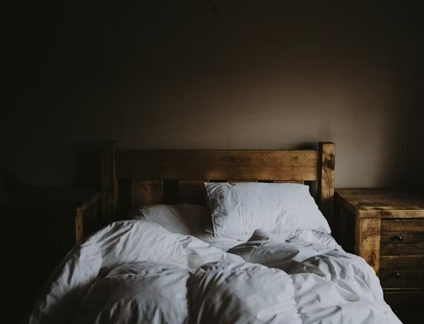 bed with white sheets