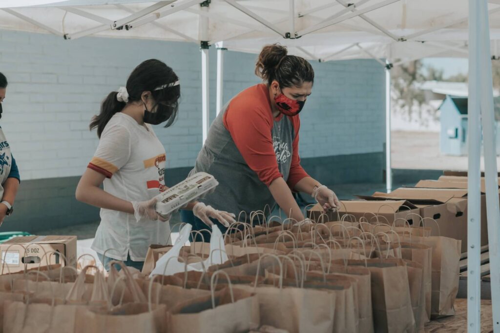 Neighborhood watch volunteers packing goods