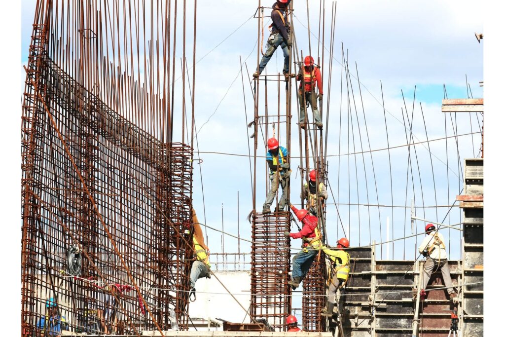 A group of busy construction workers