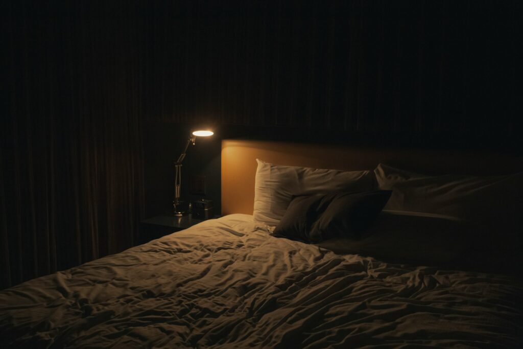 Messy, lived-in bed.