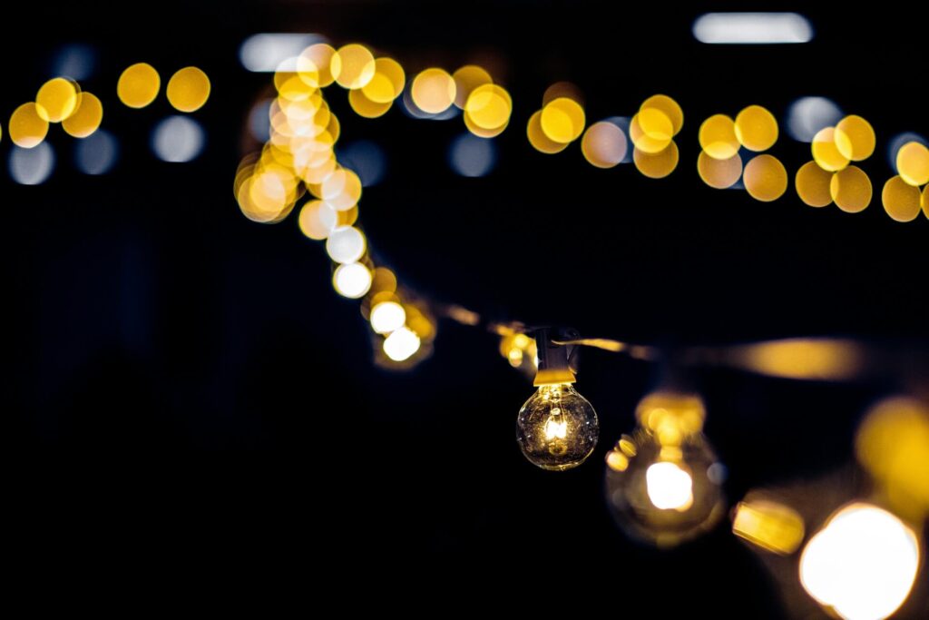 String lights in a backyard.