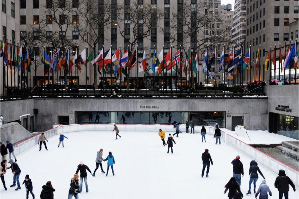 living in a big city - people skating on snow