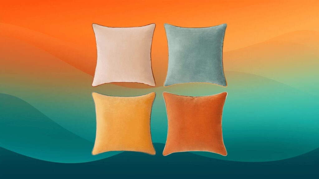 four pink, yellow, teal, and orange mid-century modern furniture pillows in front of an orange and teal background