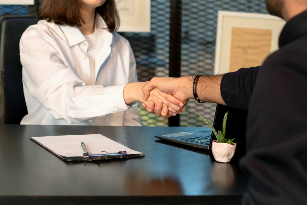 People shaking hands.