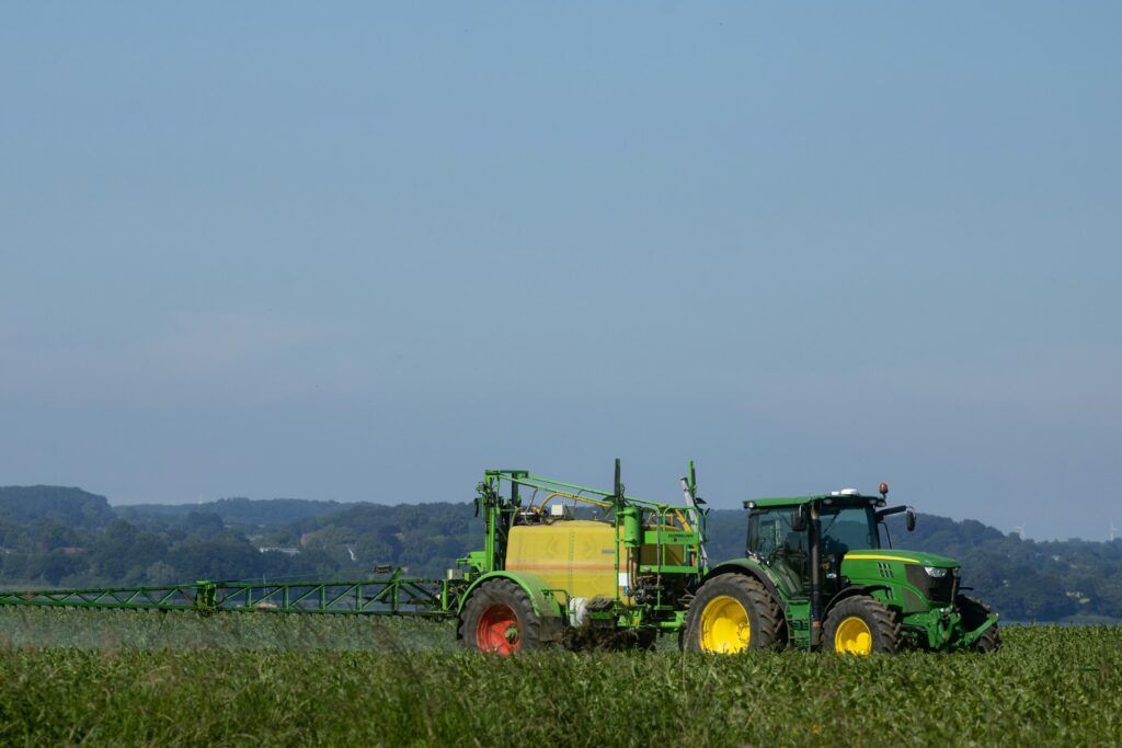 Farmers spraying pesticides.