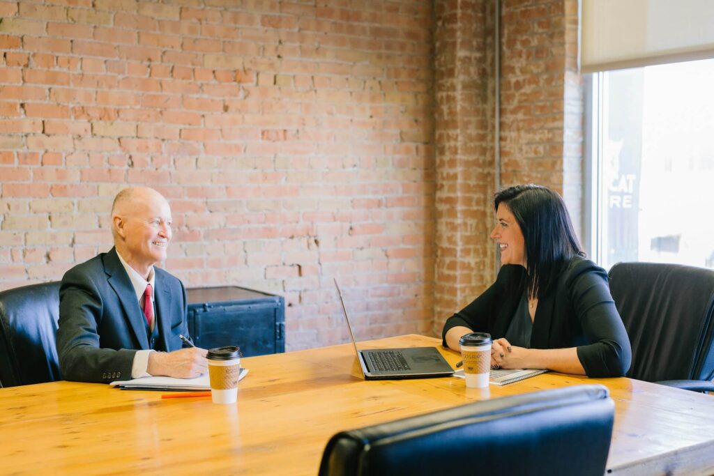 Two persons have a pleasant conversation