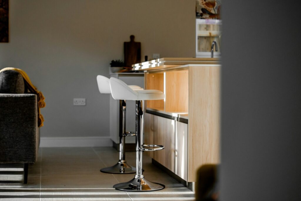 Bar with white swivel barstools