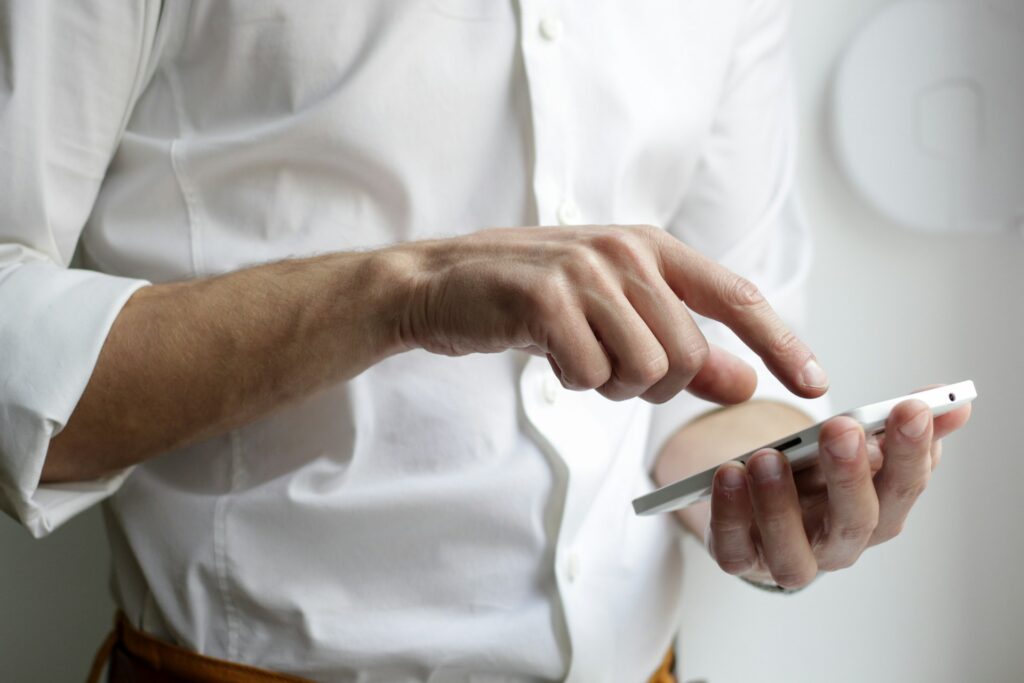 real estate agent's hands with their phone
