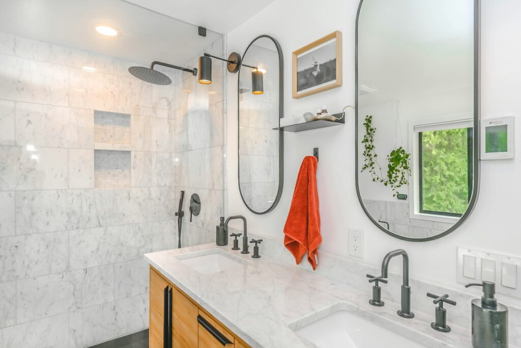 Clear, frameless glass doors maintain long sightlines, which can make any bathroom feel more spacious.