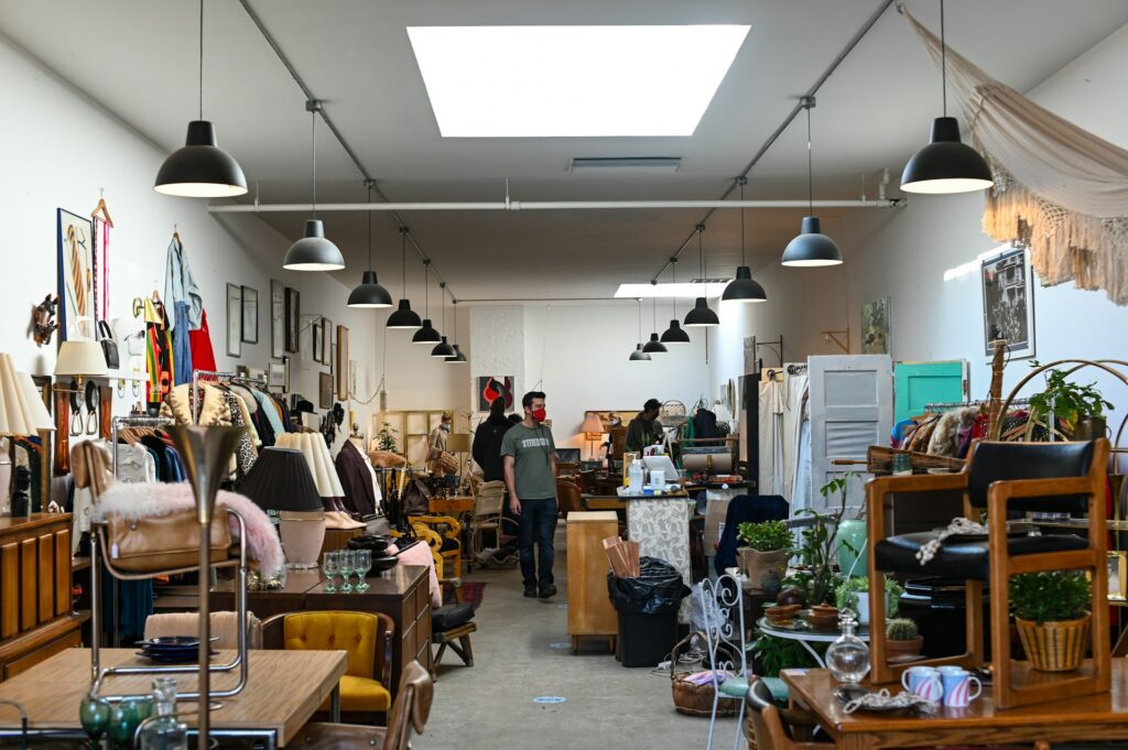 Customers walking inside a crowded thrift shop