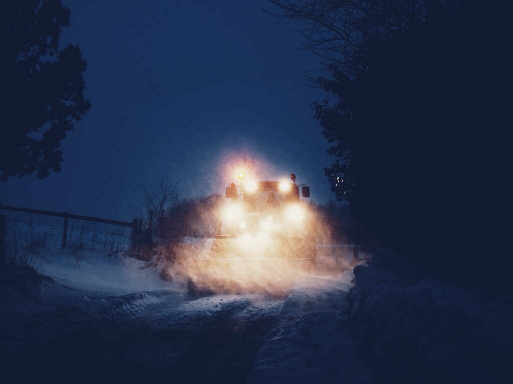 snow plow at night