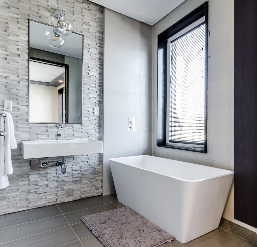 white ceramic bathroom with a white window