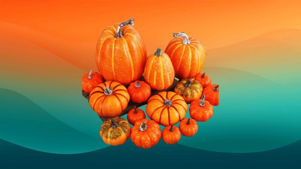 Thanksgiving decor faux pumpkins in orange and red in front of an orange and teal background